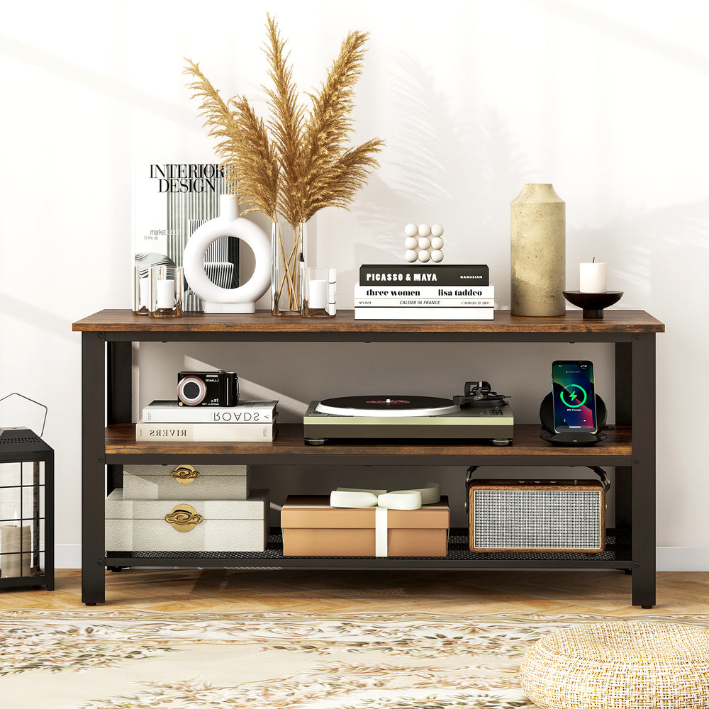 Industrial TV stand in rustic brown with power outlets, featuring two shelves and a stylish wood grain surface.