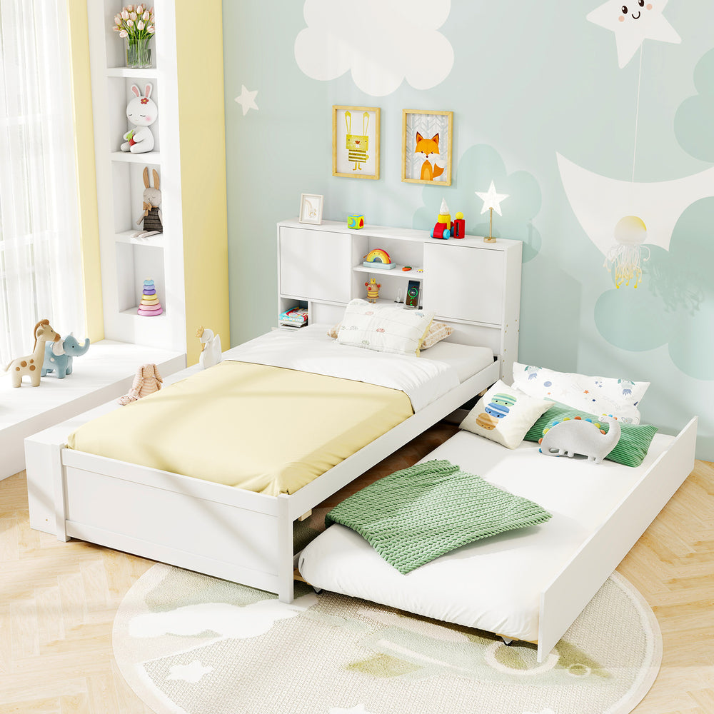 Twin size bed frame in white with trundle, storage headboard, and power outlets, ideal for sleepovers and small spaces.