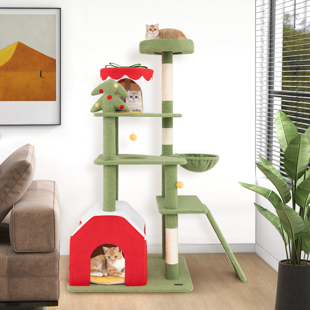 Rotary basket bed on a 61-inch green Christmas cat tree with dangling balls and plush top perch for playful kittens.