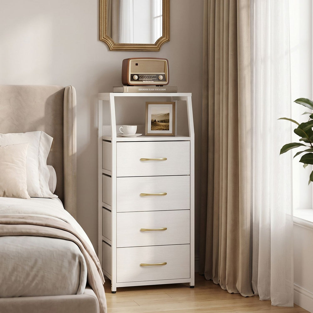 Tall dresser in white with 4 fabric drawers and metal frame, featuring open shelves for versatile bedroom storage.