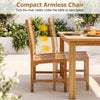 Teak wood armless dining chairs with slatted seats tuck neatly under a table to save space.