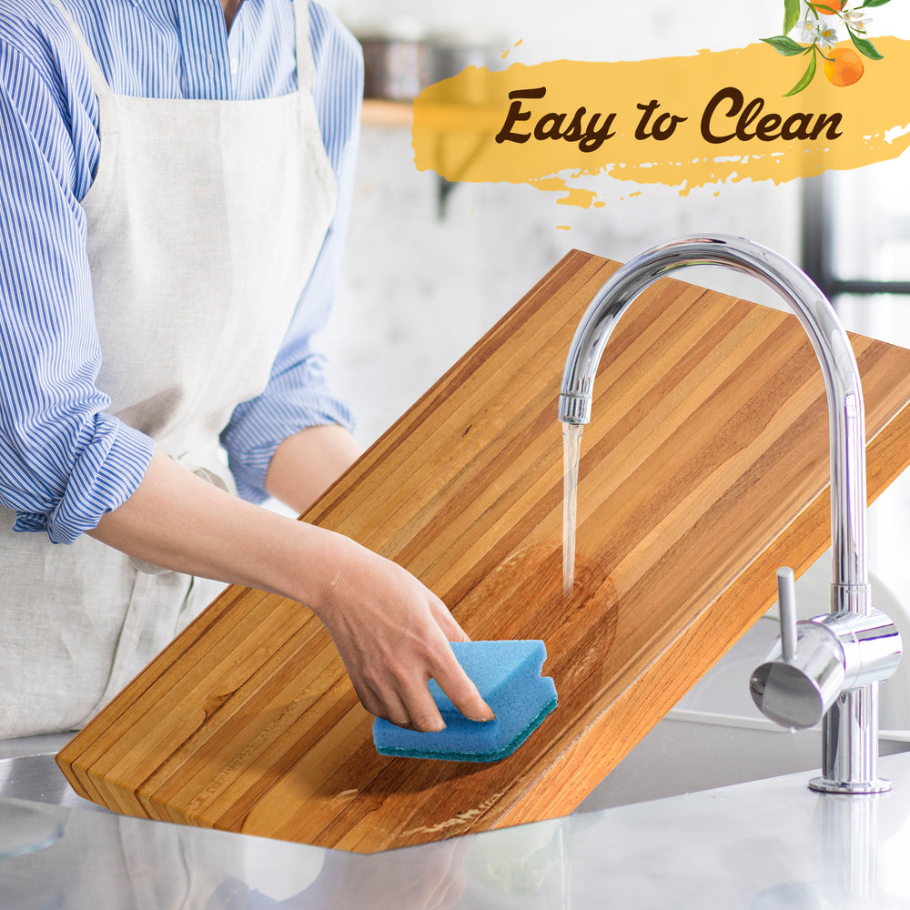 Extra large 24" reversible teak wood cutting board with handle, easy to clean, perfect for kitchen and serving.