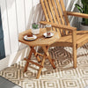 Teak wood octagon coffee table with slatted tabletop and X-shaped legs, perfect for outdoor use and space-saving.