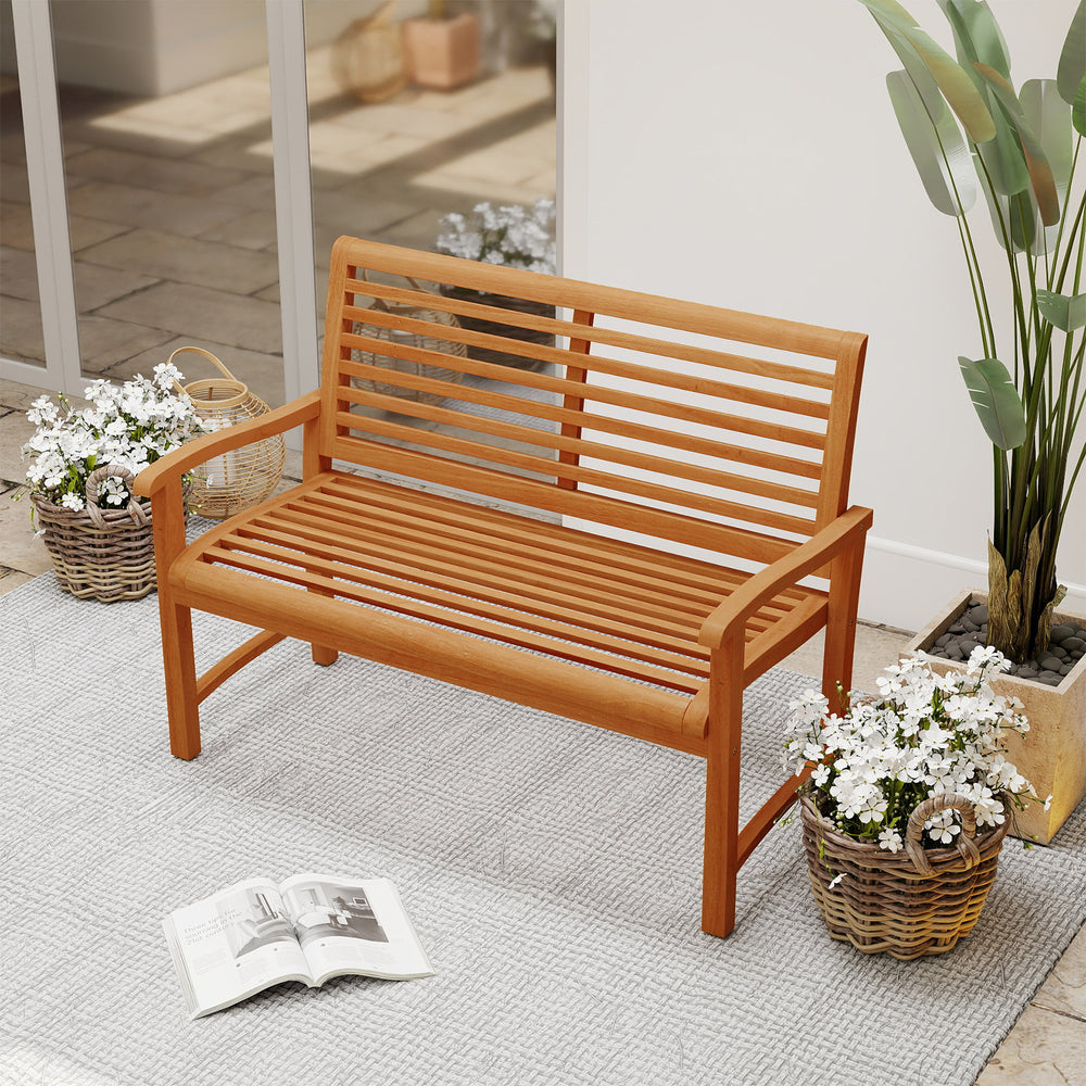Teak wood outdoor garden bench with slatted backrest, sturdy construction, and ergonomic design for patio or garden use.