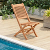 Teak wood folding dining chair with slatted seat, lightweight and elegant, perfect for poolside or backyard use.