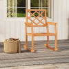 Teak wood rocking chair with backrest and slatted seat, perfect for outdoor relaxation on the porch or patio.