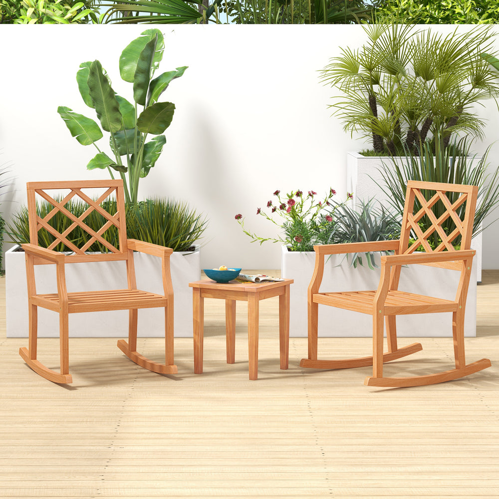 Oversized teak wood rocking chairs with backrest and slatted seat, perfect for patio relaxation and outdoor activities.