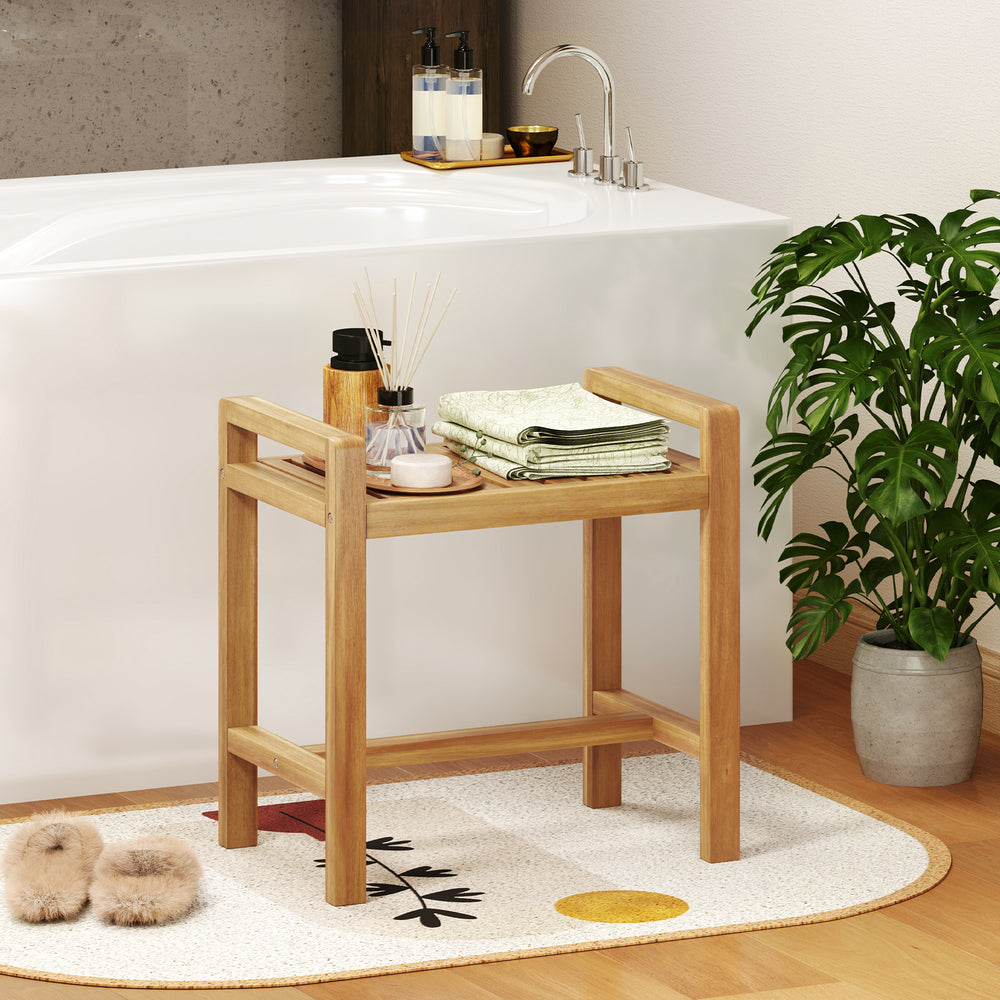Teak wood shower bench with slat top and dual side handles, perfect for bathroom storage and seating.