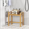 Teak wood shower bench with slat top and side handles, ideal for storage and seating in humid bathroom environments.
