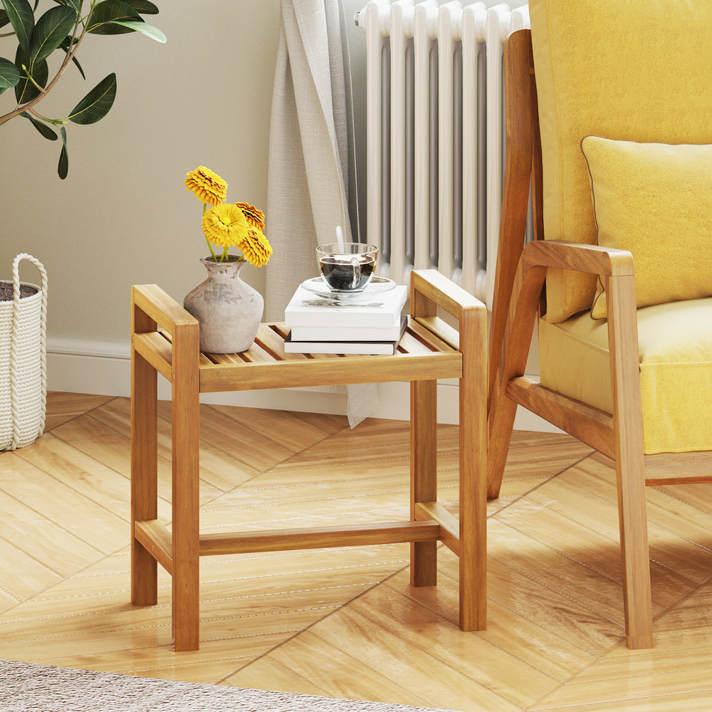 Teak wood shower bench featuring a solid structure and water-resistant finish, perfect for stylish bathroom seating.