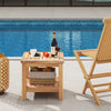 Teak wood square side table with open shelf, perfect for small spaces, placed poolside with snacks and drinks.