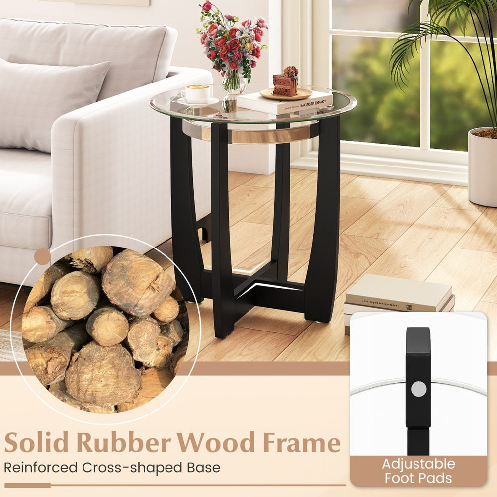 Tempered glass coffee table with solid rubber wood frame, featuring a wide tabletop and adjustable foot pads for.