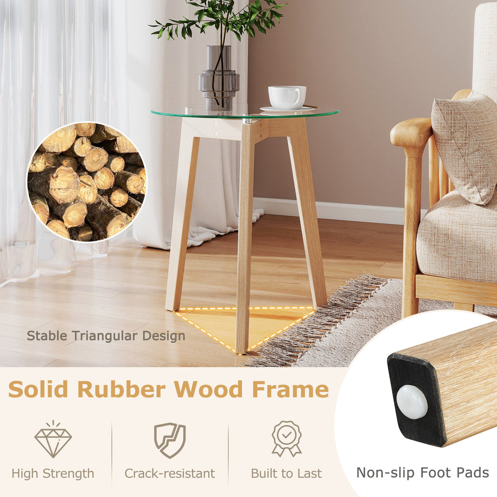 Tempered glass end table with solid rubber wood legs, featuring a minimalist design for versatile use in any room.