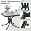 Tempered glass top patio table with a heavy-duty black metal frame, ideal for garden or poolside use.