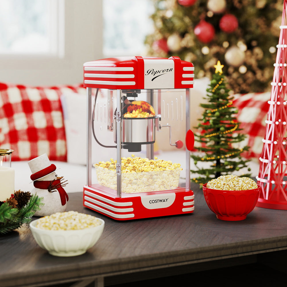 Theater style countertop popcorn maker in red with stainless steel kettle, perfect for quick and fresh popcorn serving.