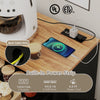 Tilt-out trash can cabinet in black with built-in power strip, adjustable shelves, and rustic barn-style doors for home.
