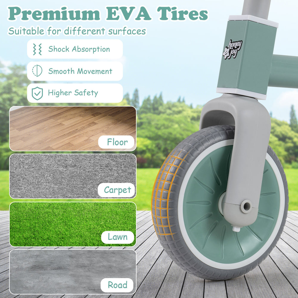 Close-up of the premium EVA tire on a green toddler convertible trike, designed for smooth movement and higher safety.