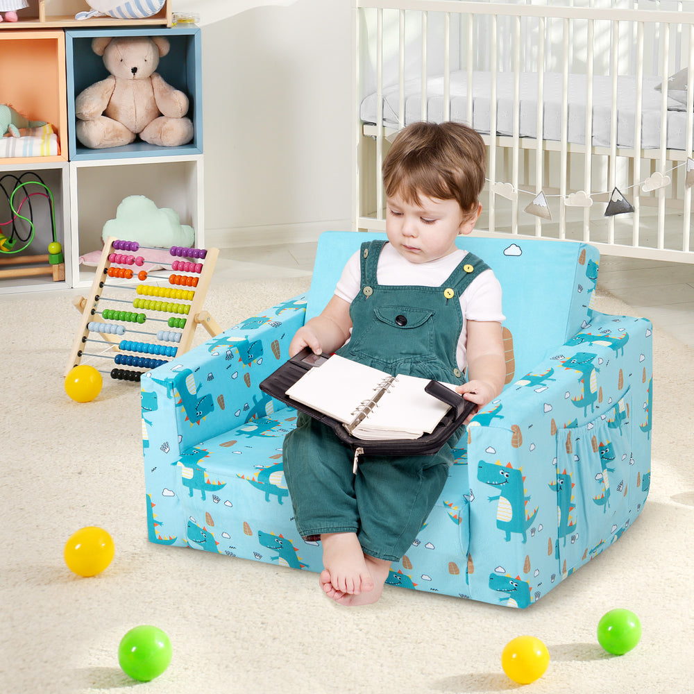 Kids recliner sofa in blue with dinosaur pattern, convertible to sleeper bed, perfect for comfort and playtime.