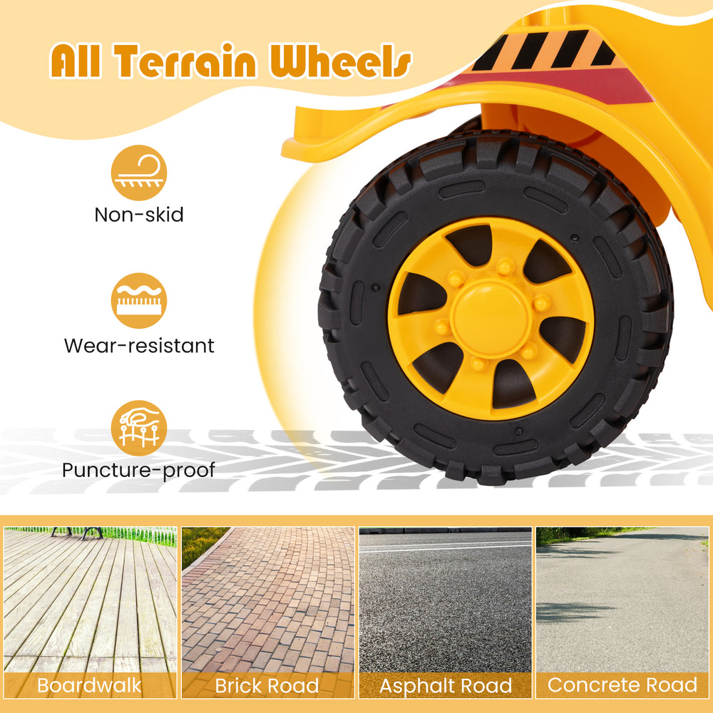 Close-up of the all-terrain wheel on a yellow toddler ride-on car, designed for stability on various surfaces.