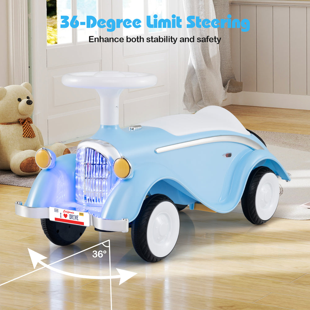 Classic blue toddler ride-on car featuring a steering wheel, LED headlights, and 36-degree limit steering for safety.