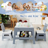 Grey toddler table and two chairs set with reversible chalkboard and whiteboard, ideal for art and learning activities.
