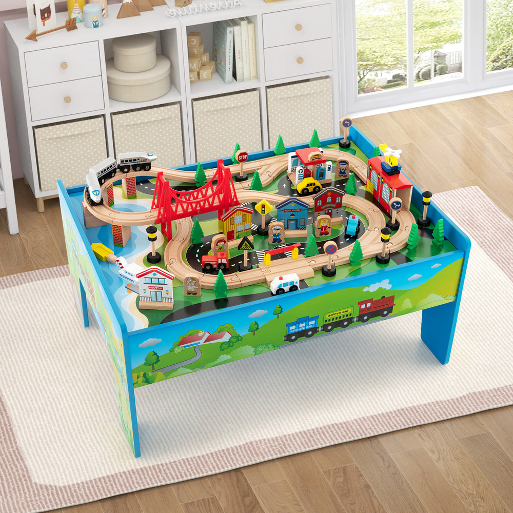 Colorful 80-piece wooden train set and table with reversible top, featuring tracks, buildings, and accessories for.