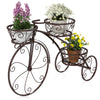 Tricycle plant stand in bronze with three hollowed baskets, ideal for indoor or outdoor plant display and decoration.
