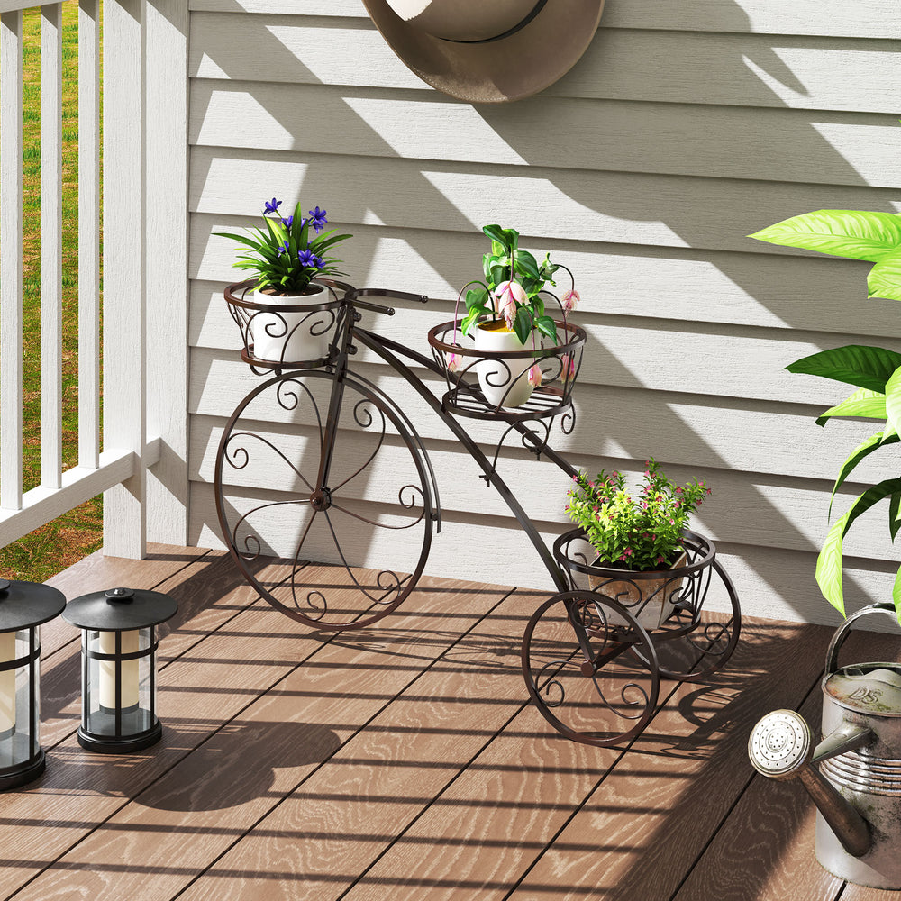 Tricycle plant stand with three hollowed bronze baskets, perfect for indoor or outdoor plant display.