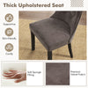 Tufted dining chair with gray premium velvet upholstery, thick padded seat, and ergonomic high backrest for comfort.