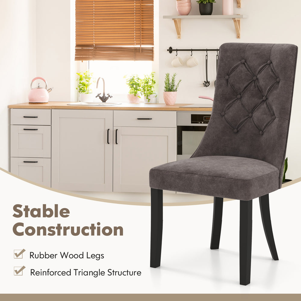Gray tufted dining chair with high backrest, rubber wood legs, and padded seat, perfect for dining and elegant spaces.
