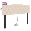 Tufted upholstered headboard in beige with rubber wood legs and 2 AC outlets, designed for queen and full size beds.