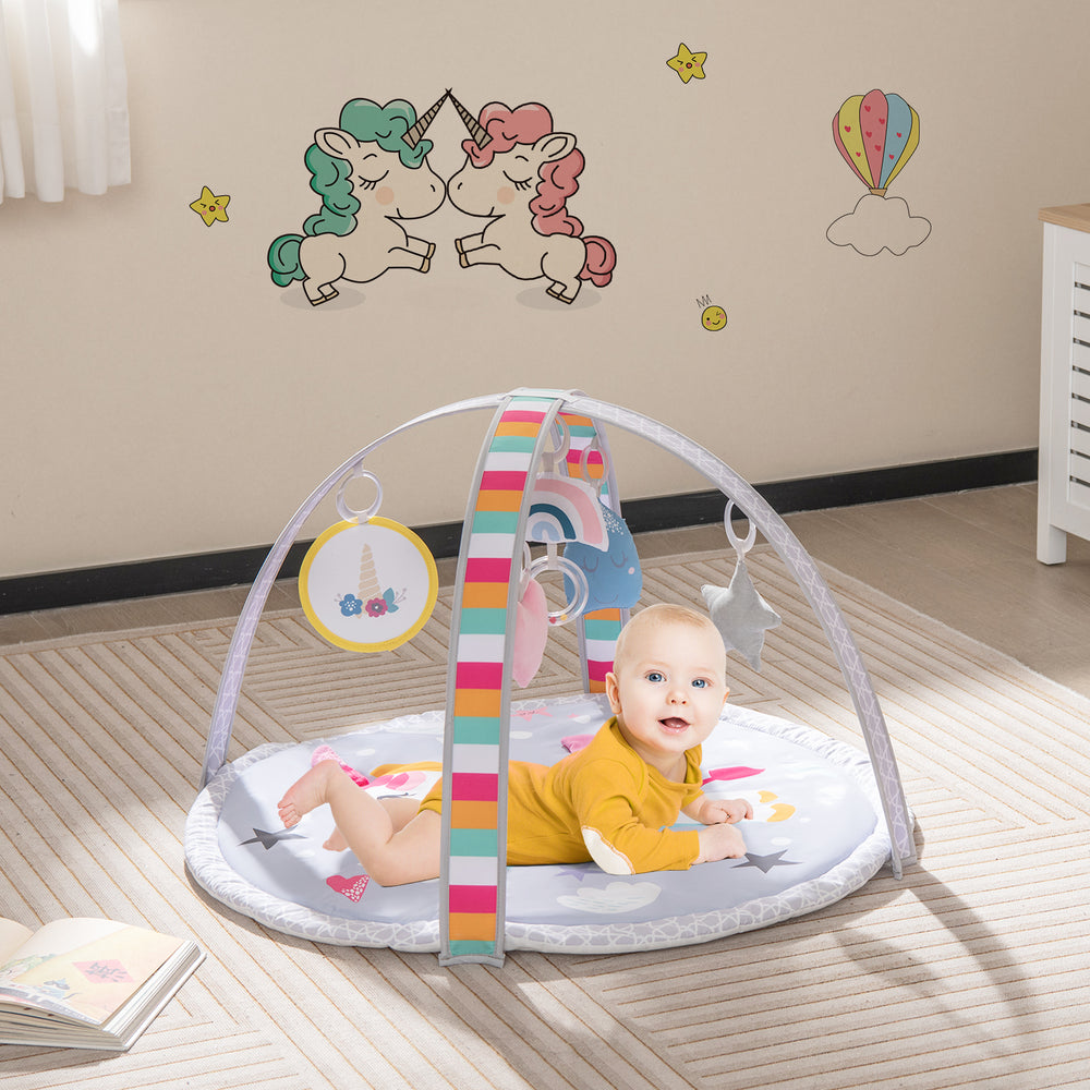 Baby play gym mat with detachable toys, multicolor design, ideal for tummy time and sensory development for infants.