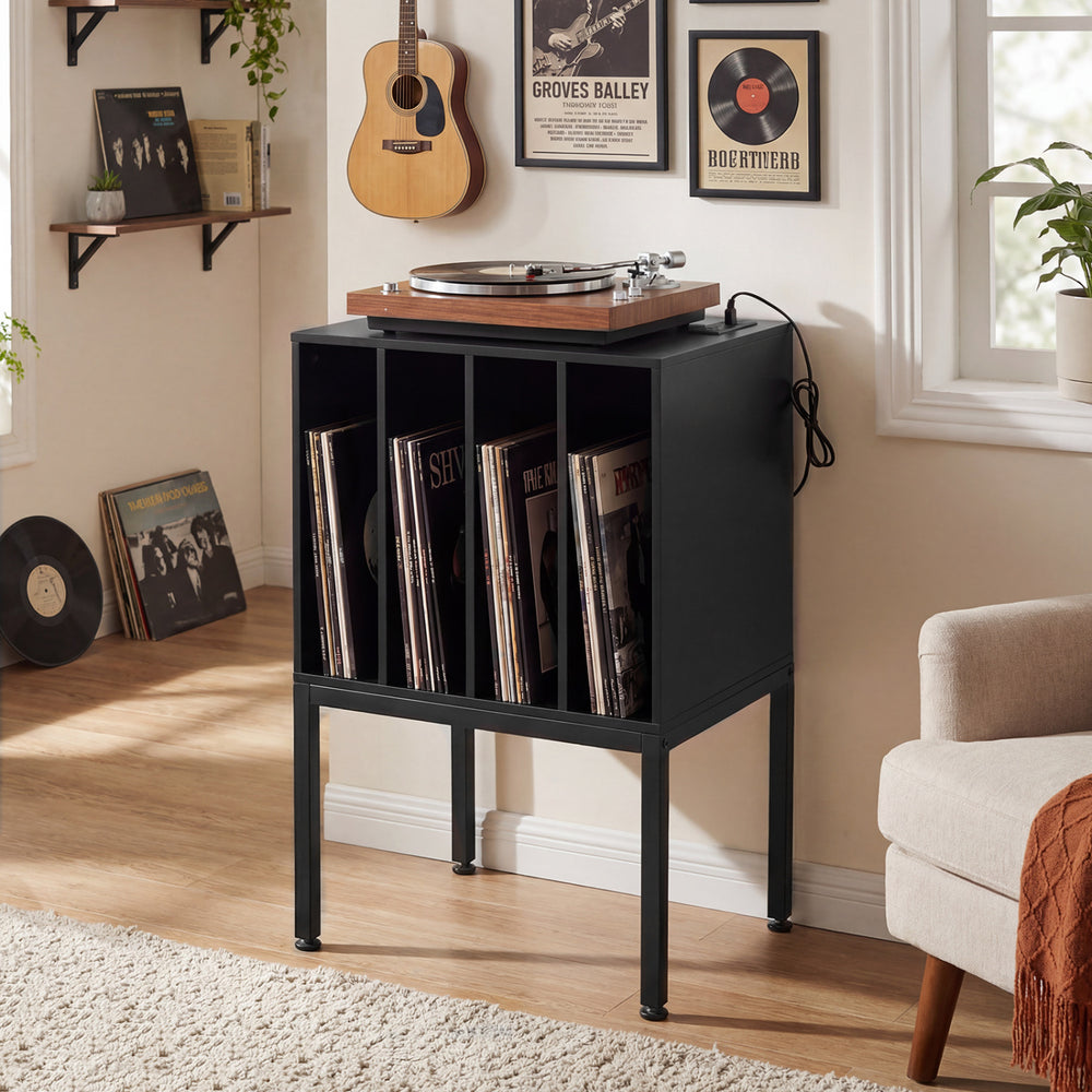 Turntable record player stand in black with power outlets, holding vinyl records and a turntable on a spacious tabletop.