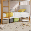 Twin over twin bunk bed with integrated ladder and safety guardrails, perfect for kids' rooms and maximizing space.