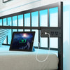 Twin daybed with built-in charging station and LED lights, featuring a sleek black design for modern interiors.