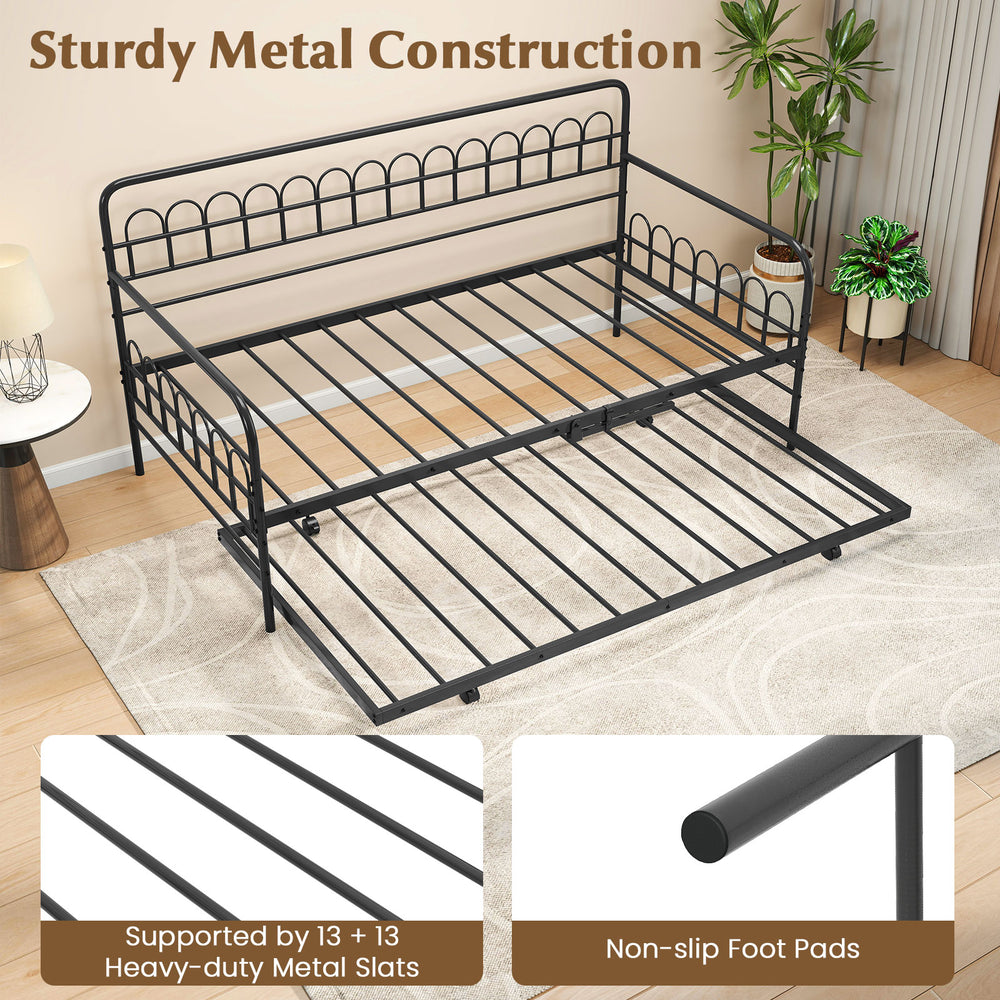 Twin daybed with curved backrest and armrests in black, featuring sturdy metal construction and pull-out trundle for.