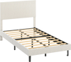 Twin size upholstered platform bed frame in beige with chevron headboard and wooden slats for sturdy support.
