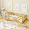 Twin Montessori floor bed with bookshelf door, natural wood frame and safety guardrails in a child’s bedroom.