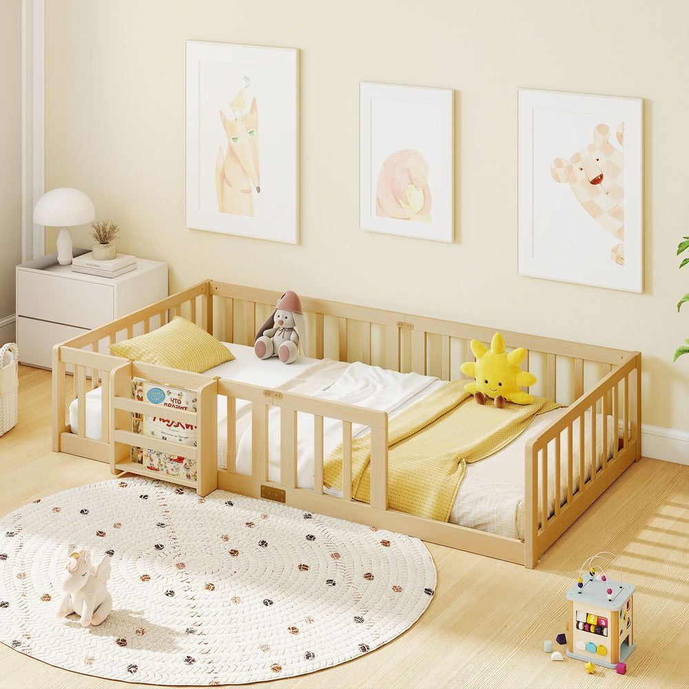Twin Montessori floor bed with bookshelf door, natural wood frame and safety guardrails in a child’s bedroom.
