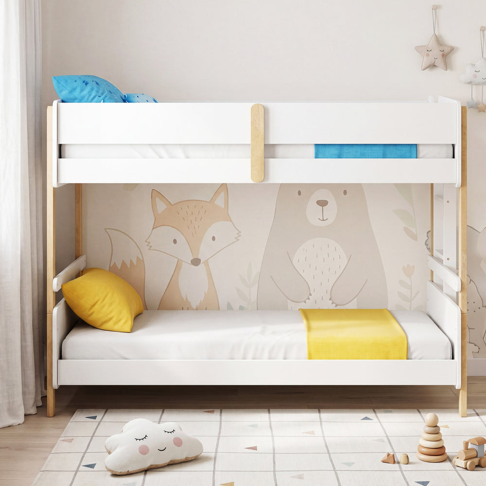 Twin over twin bunk bed in white wood, convertible to two twin beds, featuring a secure ladder and high guardrails for.