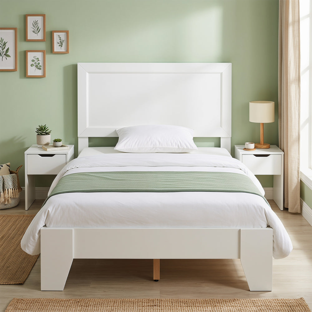 Twin size bed frame with a white headboard, featuring wooden slats and under-bed storage for small rooms.