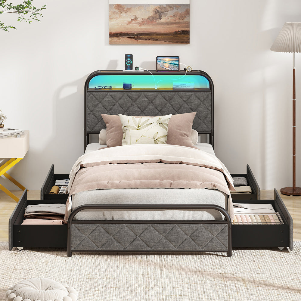 Twin size bed frame with LED lights, charging station, and fabric storage drawers for a modern bedroom setup.
