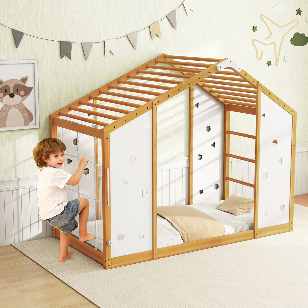 Twin size Montessori floor bed with monkey bars and playful cut-out shapes, perfect for kids' play and sleep.