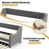 Curved armrests and button-tufted backrest of the gray twin size daybed with trundle, designed for style and comfort.
