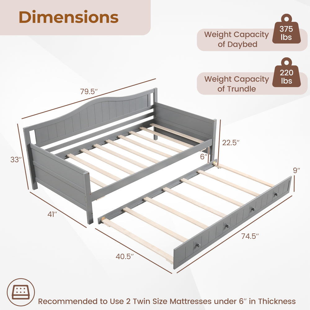 Twin size gray daybed with trundle, slats support, and wheels for easy pull-out, ideal for living rooms or guest rooms.