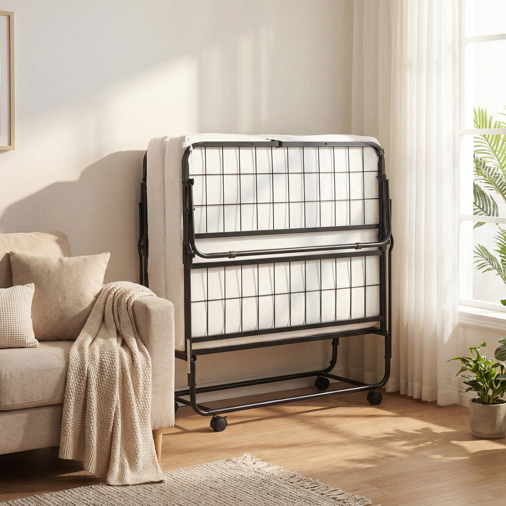 Twin size folding bed with a 5-inch gel memory foam mattress, metal frame, and wheels for easy storage and movement.