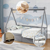 Twin size house bed in gray with roof, safety guardrail, and smooth rolling wheels for convenient storage.