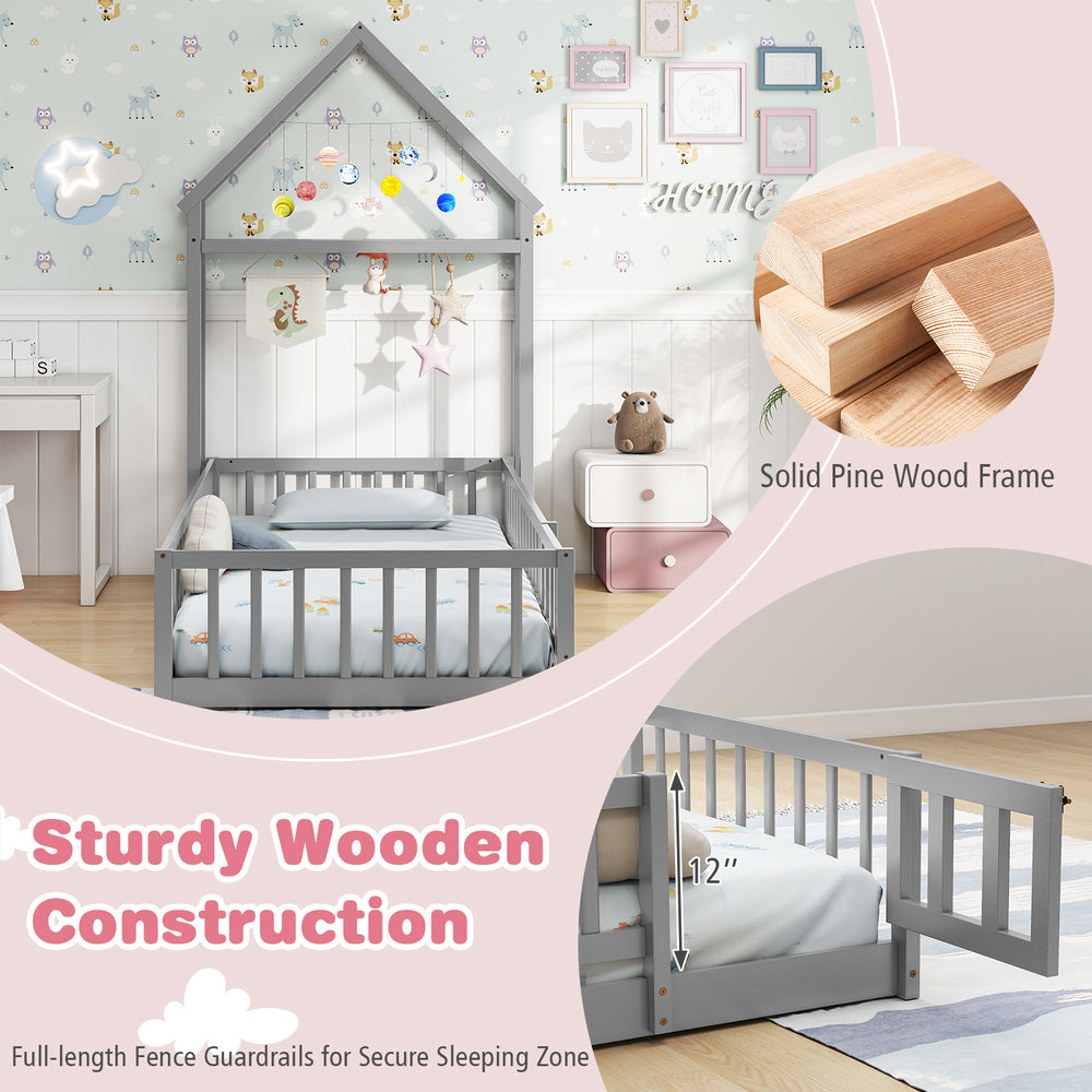 Twin size house floor bed in gray with house-shaped headboard and full-length guardrails for secure sleeping.