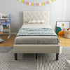 Twin size upholstered platform bed in beige with button tufted headboard, perfect for bedrooms or dorms.