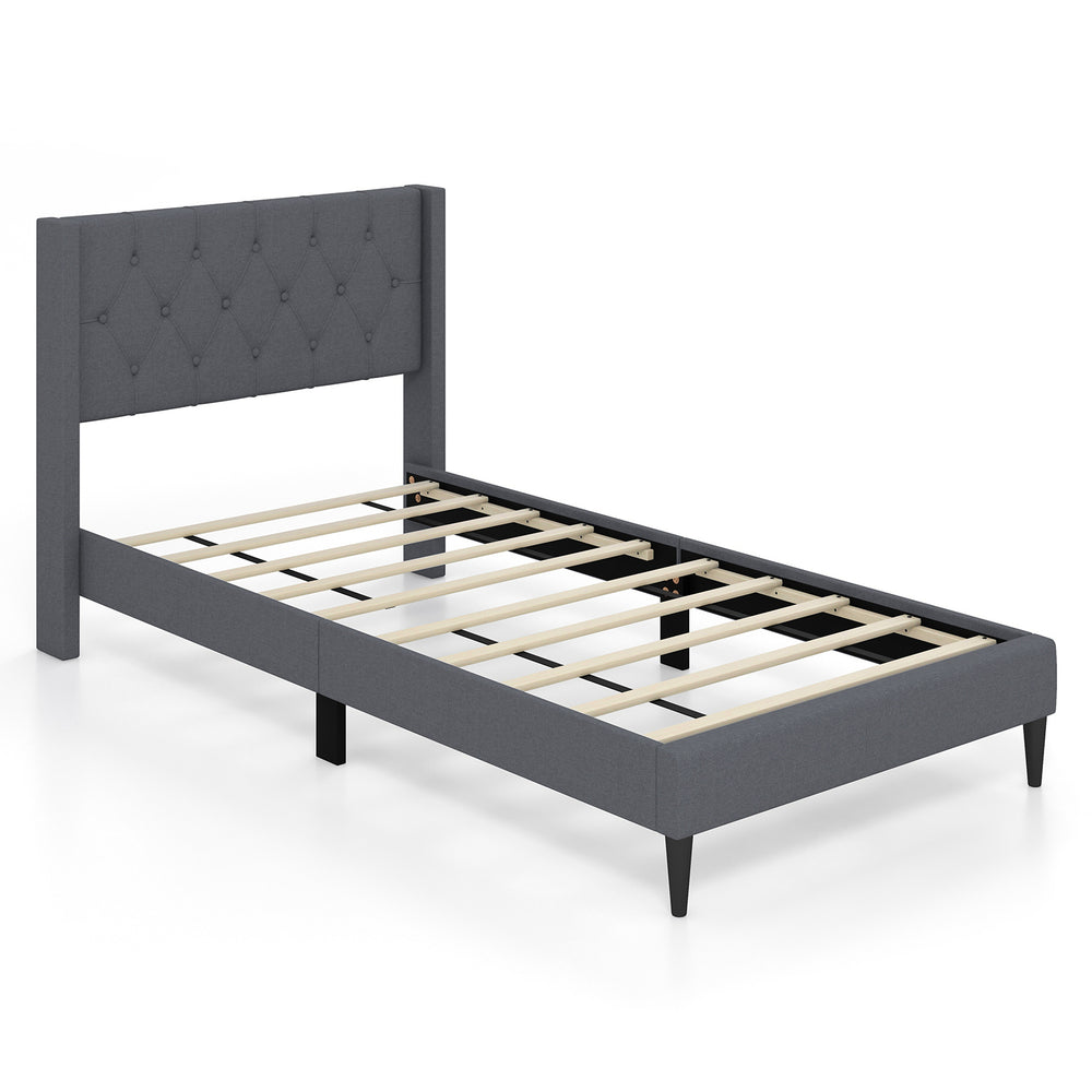 Twin size upholstered platform bed in gray with button tufted wingback headboard and reinforced wooden slats for.